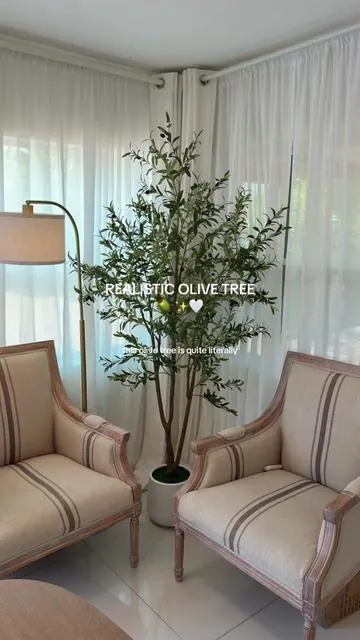super realistic, affordable & comes with a pot! 🤌🏻✨ #olivetree #homedecor #olivetreedecor #fauxolivetree #chichome 