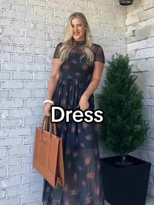 A mesh floral dress that has a sheer short sleeve and is flowy and lightweight to combat the summer temperatures. #meshdress #summerdress #floraldress #shortsleevedress #flowydress 