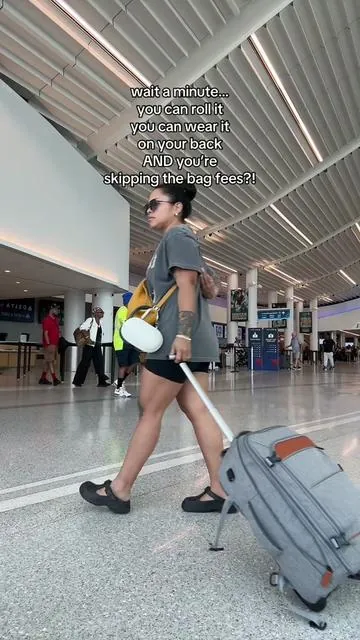 This rolling backpack carry-on is so clutch! Imagine rolling it through the airport but then wearing it on your back when you have to go up or down stairs. Fire. #traveltok #SummerVibes #DealsForYouDays #summerwins #superbrandday 