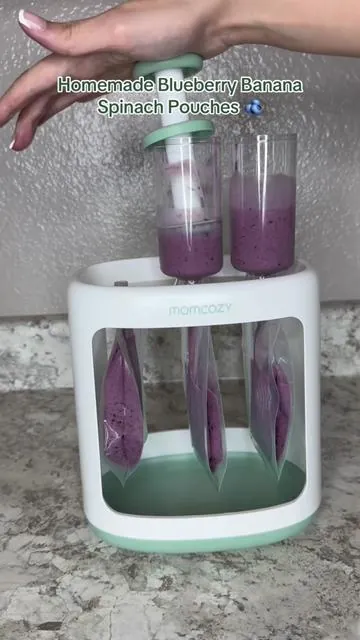 Making homemade baby food doesn’t have to mean a sink full of dishes. 💜 I used the Momcozy Baby Food Maker to chop and blend everything, then filled the pouches with the Momcozy Squeeze Station. It made the whole process so much faster and easier. Save this recipe for later👇🏽 💜 Blueberry Banana + Spinach Pouches • 1 cup blueberries • 2 bananas • Small handful spinach • ¼ cup yogurt #babymusthaves #babyessentials #dealsforyoudays #newmom #babyfoodrecipes  