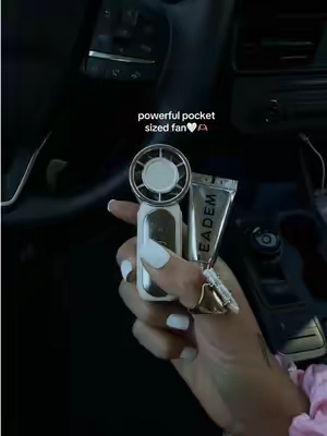 A summer MUST!! Perfect for your purse! #portablefan #rechargeablefan #summermusthaves #minifan #handheldfan 