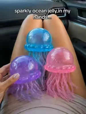 ⚡️Forbidden glitter jelly. 🪼✨ Honestly, squishing this jellyfish feels exactly like soft, pillowy dough. The texture is unreal and watching it slowly bounce back is the ultimate brain massage. Put your headphones in and let your stress melt away. 🎧☁️#jellyfishsquishy #glittersquishy #slowrising #asmrsounds #oddlysatisfying #fidgettoys