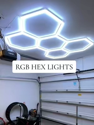 These hexagon LED panels sync to your music and turn any garage or man cave wall into an instant vibe with zero wiring skills required. #garagegoals #ledlights #mancave #homeupgrade #diyhome 