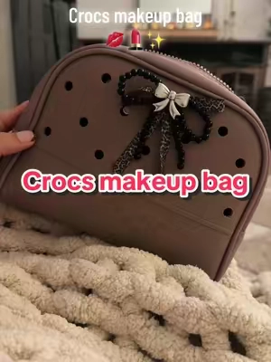The Latte Crocs makeup bag sold out SO fast. 😭 Luckily, black is still available🤎🖤 #crocscosmeticbag #crocsmakeupbag #crocsnewarrivals #crocssuperbrandday #makeupbag 