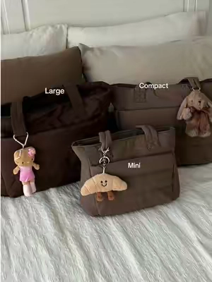 Which one will you pick🙋🏼‍♀️ this is a puffy tote that fits every part of your life🤎#totebag #collegebag #schoolbag #workbag #puffytotebag 