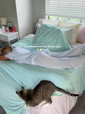 no one should be sweating all night in their sleep when these exist ✨ if you want to be covered, but can’t beat the heat- these cooling blankets are super lightweight, 100% cold to the touch, and come in a bunch of cute colors #fyp #coolingblanket #coolingsolutions #hotsleeper #hotflashesrelief 