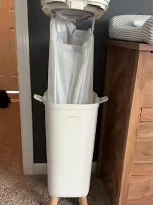 Before you waste your money on a diaper pail that’s going to fill the baby’s nursery with poop smells, check this new diaper pail out! Plus the amount of money I’m about to save on diaper pail inserts alone is astronomical bc they’re SO expensive for no reason 😅 #diaperpail #babynursery #newmommusthaves #diaperchange 