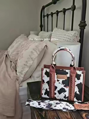 This tote is one you'll want to moo-ve to your cart. 🖤 #WranglerTote  #CowPrintStyle  #WesternGirlStyle  #TikTokShopFinds  #EverydayTote 