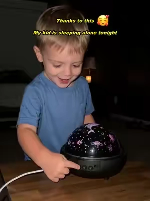 My kid finally sleeps alone.#Onefirenightlightforkids#SoothingLight#BedtimeRoutine#nightlightprojector#kidsgifts 