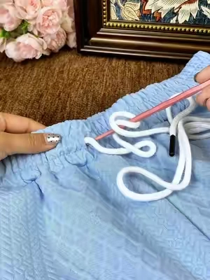 Fix slipped drawstrings easily with this handy threader tool #ClothingHacks #DrawstringTool #LifeHacks #fyp #TikTokShop