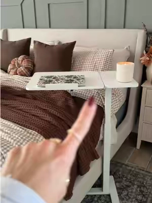 I am LOVING this sturdy adjustable table that tilts and rolls!! My husband is too 😆 make sure you get the double so it can flip to either side!! It’s so good! @Sweetcrispy Store 