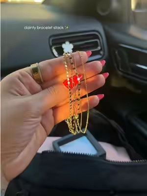 a pretty bracelet stack 🤍 #daintyjewelry #fyp #braceletstacking #goldjewelry 