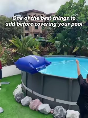 One of the best things to add before covering your pool. ❄️ This winter pool pillow makes pool closing feel so much easier.  Close it now. Open it easier later. 💦 #poolhacker #poolclosing #poolwinterizing #poolpillow #abovegroundpool 