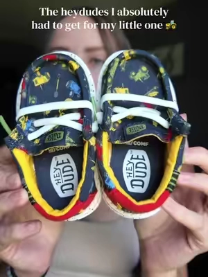 Yeah so he absolutely had to have these 🥹🚜 #heydudeshoes #heydude #toddlershoes 