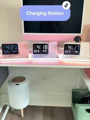 One charging station, less clutter. Charge your phone, watch, and earbuds while keeping the time, temperature, and a soft night light all in one spot. ⚡✨ #TechFinds #DeskSetup #NightstandEssentials #TikTokShop #GadgetFinds