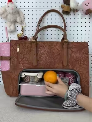Obsessed with this embossed brown tote – it’s like a portable office + fridge. Pockets for everything, and it matches all my outfits. New daily essential! 🔥👜🌟#backtoschool #TikTokshopbacktoschool #lovevook #workbag #lunchbag 