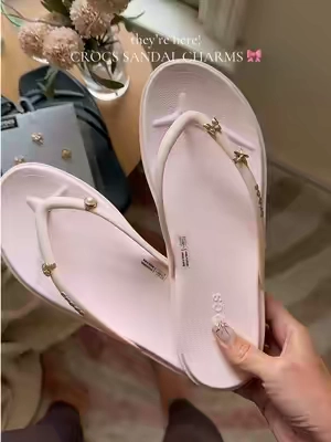 I have bought so many of these! So cute! 🎀🕯️ #crocs #crocsnewarrivals #sandalcharms #flipflopcharms #crocsaccesories 