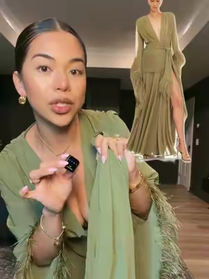 As soon as I saw this beautiful green feather dress I had to have it! #eveningdress #formaldress #bridesmaidsdresses #weddingdress #eveninggown 