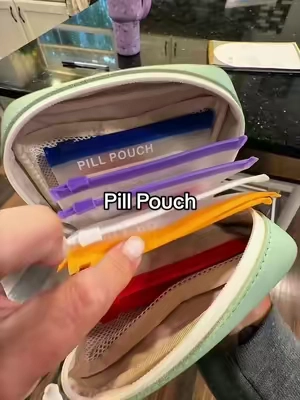 One of the best travel hacks I use! A pill pouch organizer that keeps all our meds organized and in one spot.  Very convenient! #pillorganizer #medicineorganizer #travelessentials #pills #travelhack 