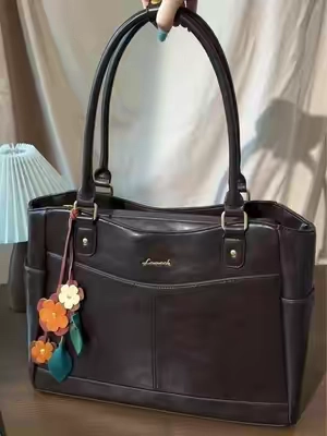 Can it fit a 15-inch laptop, a tablet, a hardcover book, and a snack? Yes, and still have room for your wallet. Tested and proven. 🫶🏻🩷#TikTokshopbacktoschool #backtoschool #workbag #totebag #everydaybag 
