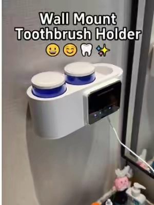 Your toothbrush deserves better! This wall- mounted UV sterilizer kills bacteria, dries brushes, and saves counter space all in one sleek design. #UVToothbrushHolder #BathroomGadget #HomeEssentials #WallMountedStorage #CleanToothbrush     