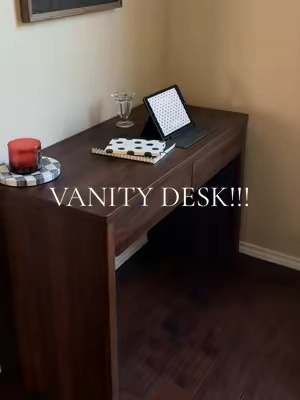 The cutest little desk and vanity plucked straight from my Pinterest board! I love how simple this is with the two separate drawers! Currently using one drawer for makeup and one for my tablet and notebooks!  Vanity Desk. Aesthetic Vanity Desk. Brown Desk Vanity. #vanity #vanitysetup #desk #officedesk #makeupvanity 