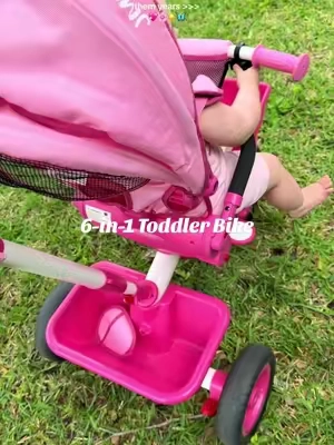 She loves being outside and pushed around 😍 you can configure it so many ways, they can peddle it once they’re old enough! #tricycle #toddlermom #girlmom #firstvideo #toddlerbike 