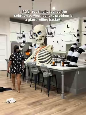 One trip instead of carrying piles of laundry all over the house. 🙌🧺 #laundryhack #momhacks #halloweendecor #momlife 