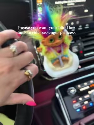 Creepy baby can’t ride in the car during the summer heat but troll baby seems content, except she needs road snacks 😏 #MomsofTikTok #squishy #haul #collection #trolls 