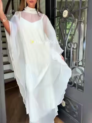 Such a stunning creamy white slip dress with fun overlay! This dress is giving bridal and expensive! I’m 5’8 135 wearing a small. @Likemychoice Global #bride #whitedress #bridal #slipdress #maxidress 