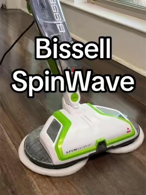 The Bissell SpinWave Hard Floor Spin Mop uses two rotating, washable pads and a front sprayer to scrub sealed hard floors with less effort. #Bissell #BissellSpinWave #SpinMop #FloorCleaning #CleaningTools
