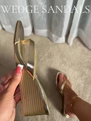 So classy & cute! #wedgesandals #flipflops #goldsandals #summerwedges #kittenheels 