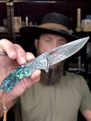 Really cool Damascus steel blade with that abalone shell-style handle. Definitely a unique-looking pocket knife! #DamascusSteel #PocketKnife #EDC #KnifeCollection #EverydayCarry
