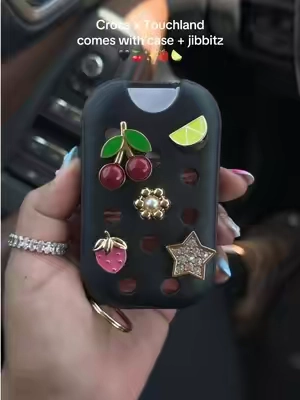 This new case is so cute & you can choose from different scents 🍒✨🍋‍🟩 @touchland #touchland #touchlandhandsantitizer #handsanatizer #touchlandxcrocs 