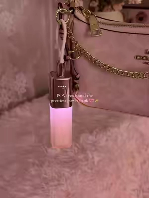 This cute little power bank fits right in my purse and keeps my phone charged wherever I go.💖 #powerbank #batterypack #travelessentials #phonecharger#TikTokshopbacktoschool