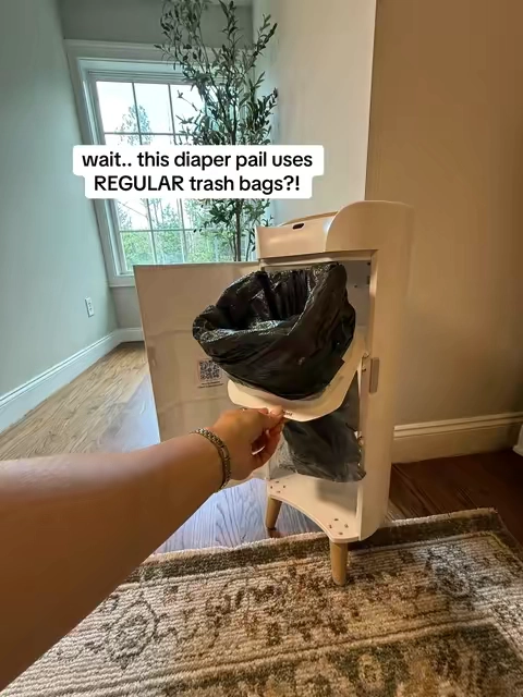 Why are we buying special refill bags for EVERYTHING baby related?! 😂 This Jool Baby diaper pail can use regular kitchen trash bags, and that alone makes it so much more practical. One less refill I have to remember to reorder 🙌 #jooldreamteam #diaperpail #babyessentials #nurseryessentials #babyregistry 