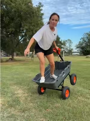 Heavy duty dump cart that makes hauling stuff around the yard so much easier. #DumpCart #GardenCart #YardWork #LawnCare #OutdoorTools 