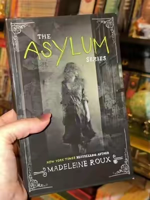 You should see how many actual photos are inside these books. 😳 #horror #horrornovel #asylum #asylum #BookTok 