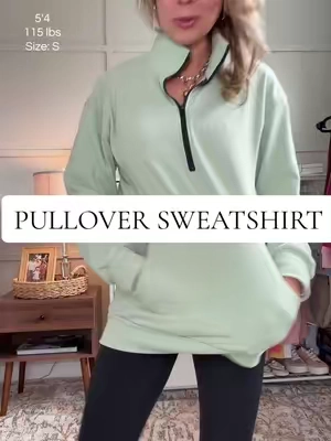 Perfect lightweight pullover sweatshirt for fall.  It's butter soft, has a half zip and a pocket.  #fallsweatshirt #pulloversweatshirt #halfzipsweatshirt #sweatshirtseason #cozyfallstyle 