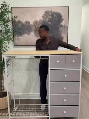 A affordable clothing rack with a built in dresser and charging port