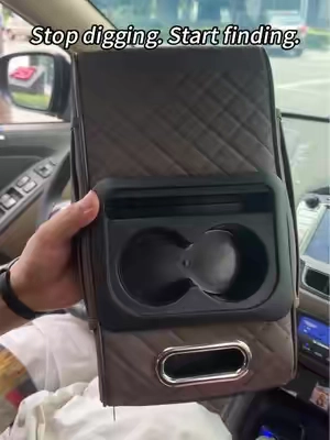 Your car's center console is a black hole. 🕳️🚗
 AutoVerve Elite 4-in-1 armrest pad.
 Armrest box. Storage bag. Console organizer.
 Fits perfectly. Keeps everything in place.
 Clean. Organized. Easy access.
 Link in bio 🧹#CarOrganizer #ArmrestPad #CarStorage #ConsoleOrganizer #CarInterior
