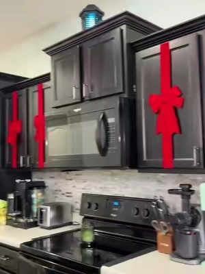 Doing the cabinet bows this year! #christmasdecor #christmascabinetbows #cabinetdoorbows #kitchenchristmasdecor 