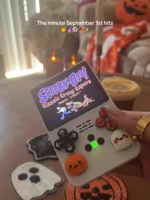 Nostalgic cozy gaming begins! 🎃This device has literally over 15,000 of our favorite childhood games! #retrogaming #handheldgameconsole #nostalgiacore #90skid #tiktokshopcreatorpicks 