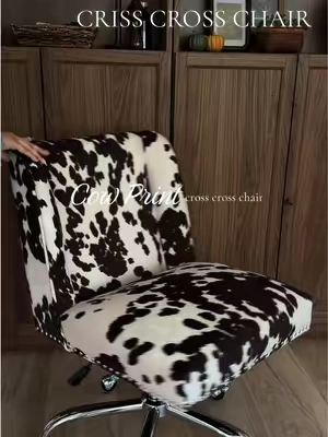 #crisscrosschair #rollingchair #cowprint #chair 